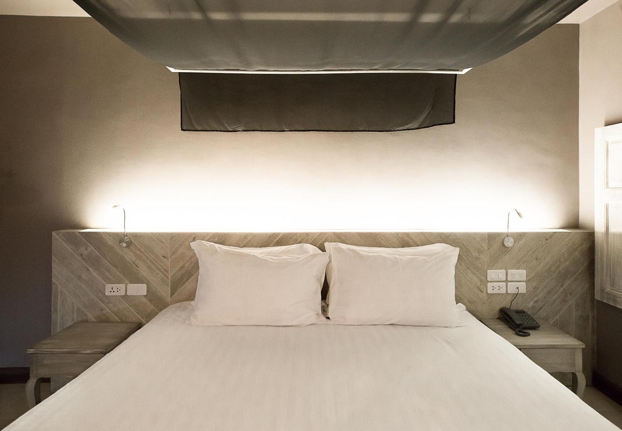 Art Mai Gallery Nimman Hotel Chiang Mai Eksteriør bilde A bed